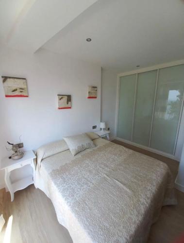 Ένα ή περισσότερα κρεβάτια σε δωμάτιο στο Apartamento II Playa