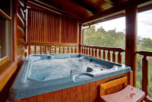 a jacuzzi tub in the middle of a house at Belvedere by Eden Crest in Sevierville