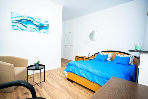 Ένα ή περισσότερα κρεβάτια σε δωμάτιο στο Chambre R1 avec salle de bain privée