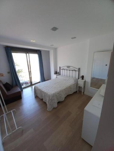 Katil atau katil-katil dalam bilik di Apartamento I Playa