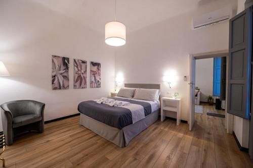 Ένα ή περισσότερα κρεβάτια σε δωμάτιο στο Dea Luxury casa vacanze- zona Chiesa a Trullo -