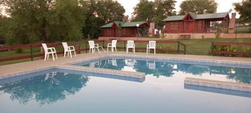 Bazén v ubytování Complejo Costario nebo v jeho okolí