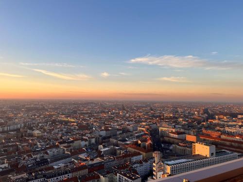 an aerial view of a city at sunset at Park Inn by Radisson Berlin Alexanderplatz in Berlin