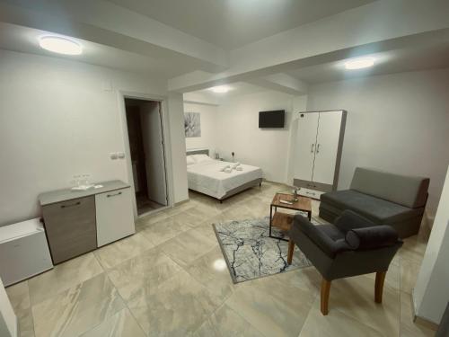Postel nebo postele na pokoji v ubytování GreenHill Apartments