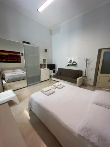 Postel nebo postele na pokoji v ubytování Bross apartament