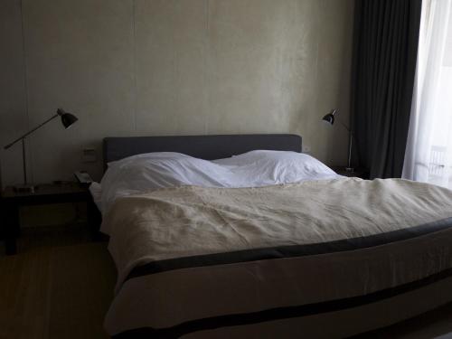 Postel nebo postele na pokoji v ubytování Atta Room Only