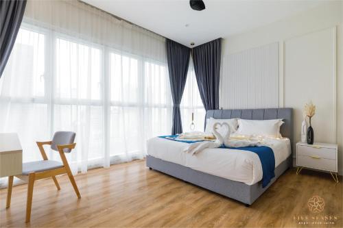 Ένα ή περισσότερα κρεβάτια σε δωμάτιο στο Quill Residences Kuala Lumpur, Five Senses