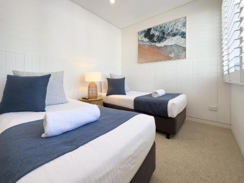 Ein Bett oder Betten in einem Zimmer der Unterkunft The Rise Noosa