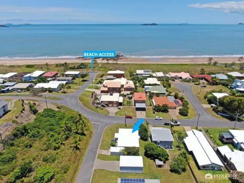 an aerial view of a suburb with the beach at Colleen's Beach Shack! in Emu Park
