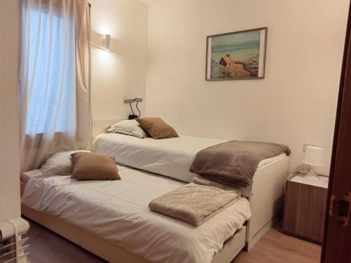Postel nebo postele na pokoji v ubytování Superb flat in the centre of capital, ski, Caldea