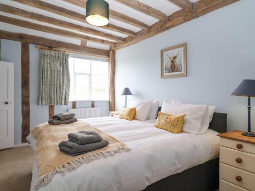 Postel nebo postele na pokoji v ubytování South Grange House - Sleep 16