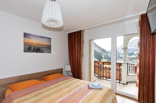 Postel nebo postele na pokoji v ubytování Residenz Ambassador