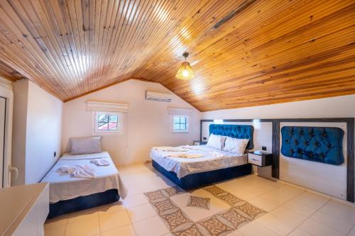 Katil atau katil-katil dalam bilik di Apart Ova - 3 bedrooms