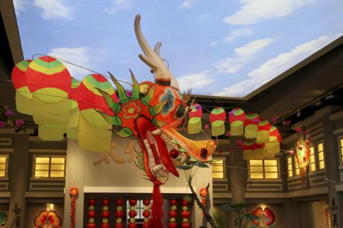 a dragon decoration in front of a building at HUALUXE Yangjiang City Center in Yangjiang