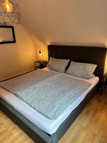 Letto o letti in una camera di Pfalzliebe Ferienwohnung Luna
