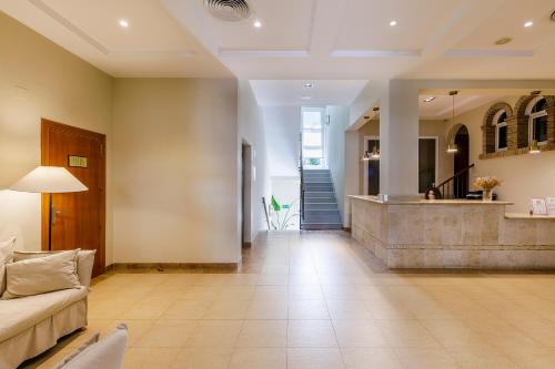 Posezení v ubytování Hotel Almijara - Mares