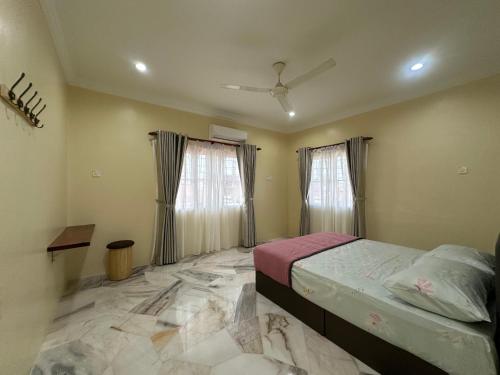 Ένα ή περισσότερα κρεβάτια σε δωμάτιο στο UncleLiew Cozy Home 老刘民宿
