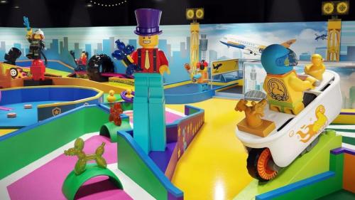 a lego play set with a toy motorcycle and people at Holiday Inn Slough Windsor by IHG in Slough