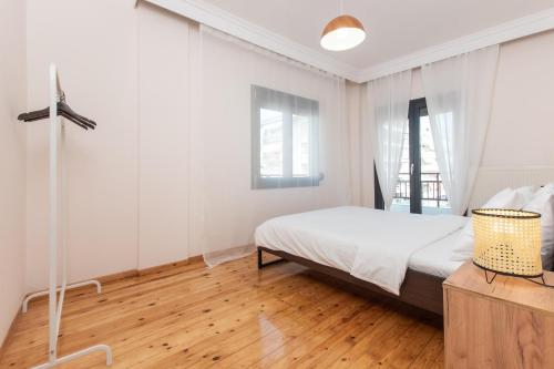 Ένα ή περισσότερα κρεβάτια σε δωμάτιο στο Houseloft Urban Retreat