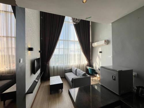 Χώρος καθιστικού στο Teamwork Melaka - Duplex Entire Unit Ayer Keroh