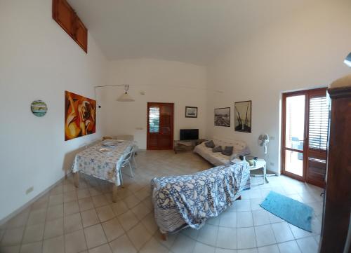 Postel nebo postele na pokoji v ubytování Villa Punta Lunga