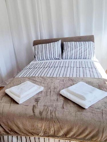 Llit o llits en una habitació de Studio Apartment Iva