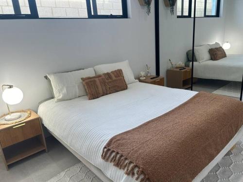Postel nebo postele na pokoji v ubytování North Coogee Escape 2B2B