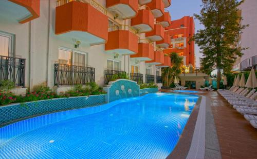 a swimming pool in the middle of a building at Antique Roman Palace Museum Hotel - Adults Only Ultra All Inclusive in Alanya