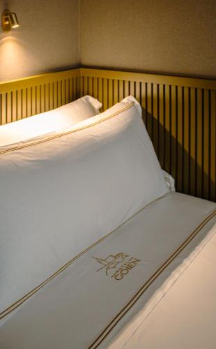 Un ou plusieurs lits dans un hébergement de l'établissement GOIEN BOUTIQUE HOTEL