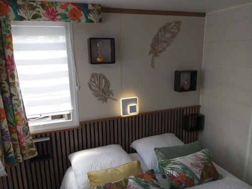 Posteľ alebo postele v izbe v ubytovaní Gîte Panda house