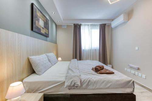 Luxury Sliema Stay with Sea Views-Apt14にあるベッド