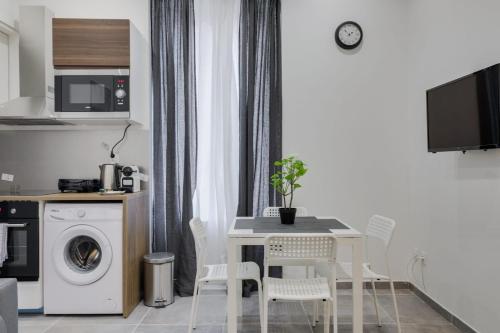 Η κουζίνα ή μικρή κουζίνα στο GuestReady - 1chambre, 5min Gare Part Dieu