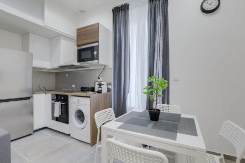 Η κουζίνα ή μικρή κουζίνα στο GuestReady - 1chambre, 5min Gare Part Dieu
