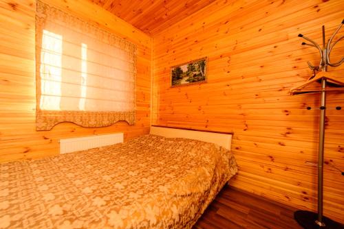 Postel nebo postele na pokoji v ubytování Petrovskyi Brovar