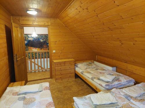 Postel nebo postele na pokoji v ubytování Chalupa Jadrná 1
