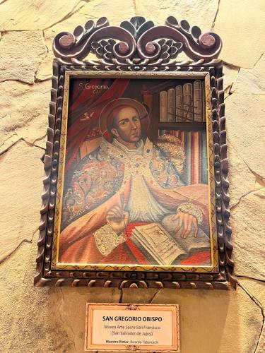 a painting of a priest hanging on a wall at Gregorio I Hotel Boutique in San Salvador de Jujuy