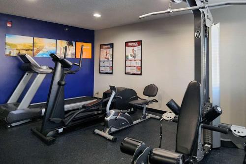 a gym with two tread machines in a room at Comfort Inn & Suites Shakopee Downtown Area in Shakopee