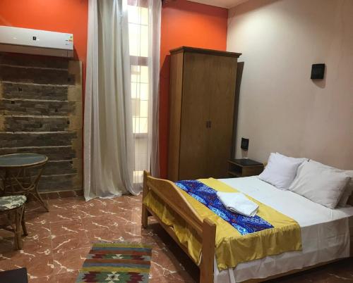 Postel nebo postele na pokoji v ubytování Golden Hotel Cairo
