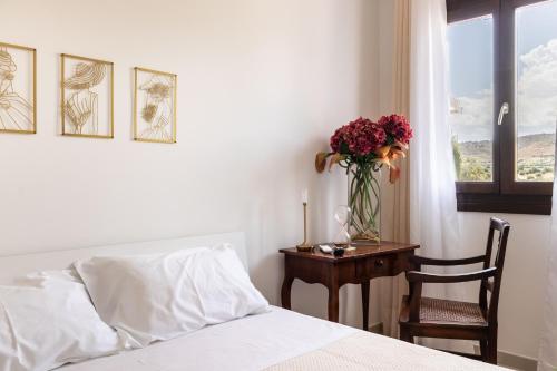 Ένα ή περισσότερα κρεβάτια σε δωμάτιο στο Villa Badessa