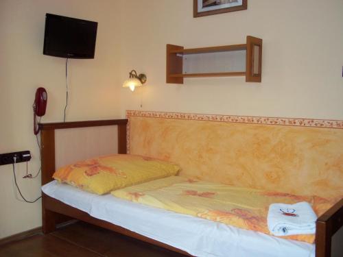 Cama o camas de una habitación en Marianum JL,s.r.o.