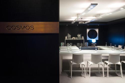 a conference room with a table and chairs at President Hotel Athens in Athens