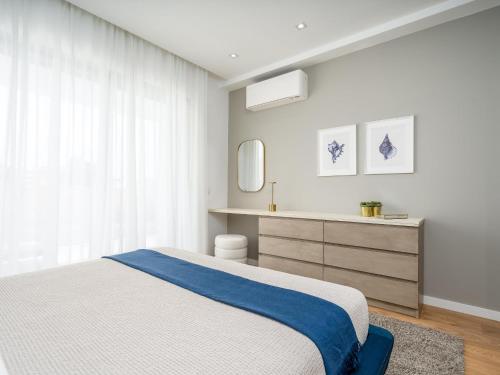 Ένα ή περισσότερα κρεβάτια σε δωμάτιο στο Luxury and Comfort Next to the Historic Center #1954