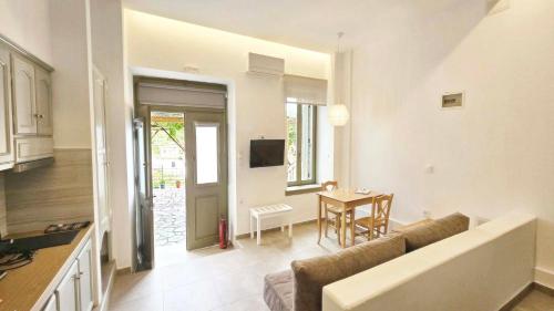 TV a/nebo společenská místnost v ubytování Horto View Suites