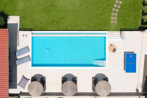 an overhead view of a swimming pool at GGA Albatross Villa in Afantou