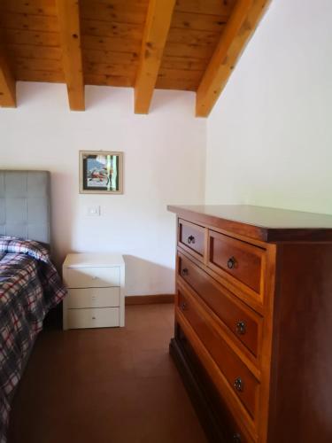 Postel nebo postele na pokoji v ubytování Residence La Pineta