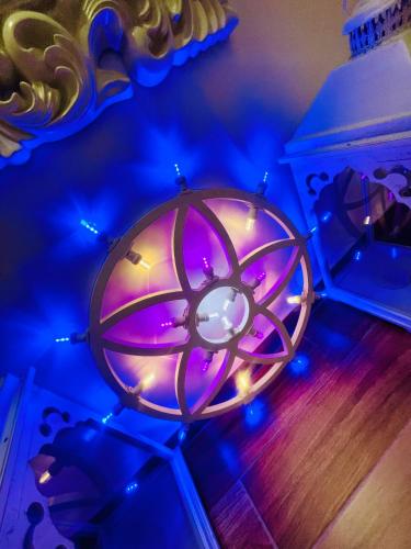 a orb with lights on the floor in a room at LOVE guest house in Modugno