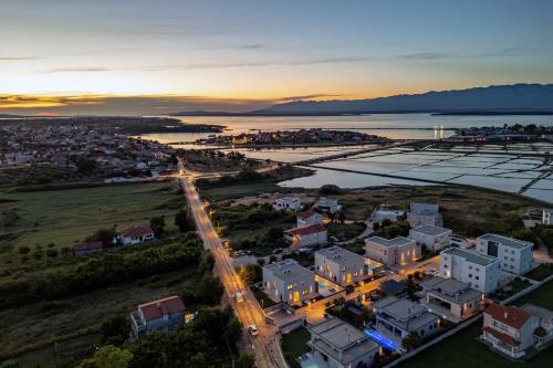 an aerial view of a city at sunset at Villa Roko Nin ZadarVillas in Nin