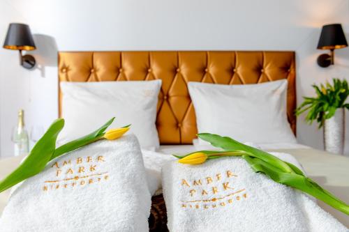Ένα ή περισσότερα κρεβάτια σε δωμάτιο στο Amber Park Spa