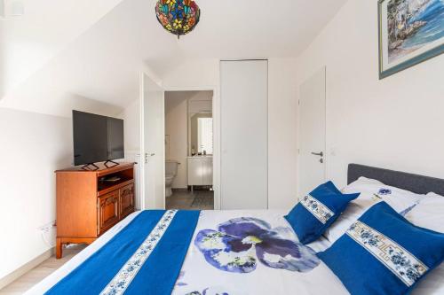 En eller flere senge i et værelse på Le Petit Roof Top