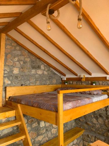 Μία ή περισσότερες κουκέτες σε δωμάτιο στο Sunset House